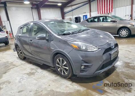 2018 Toyota Prius C from USA, damaged, VIN JTDKDTB32J1601038